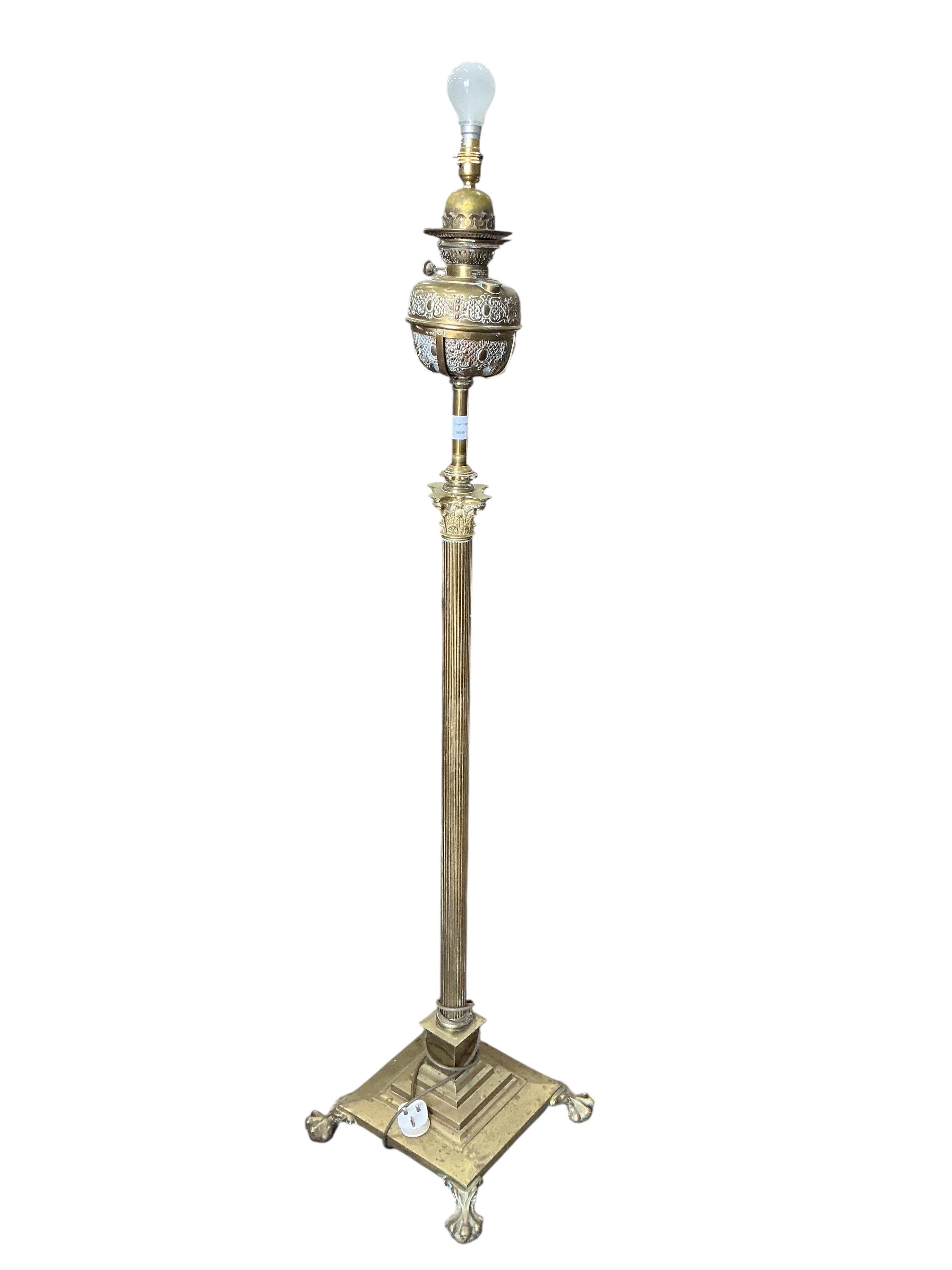 A Victorian brass telescopic Corinthian column standard lamp, converted to electricity